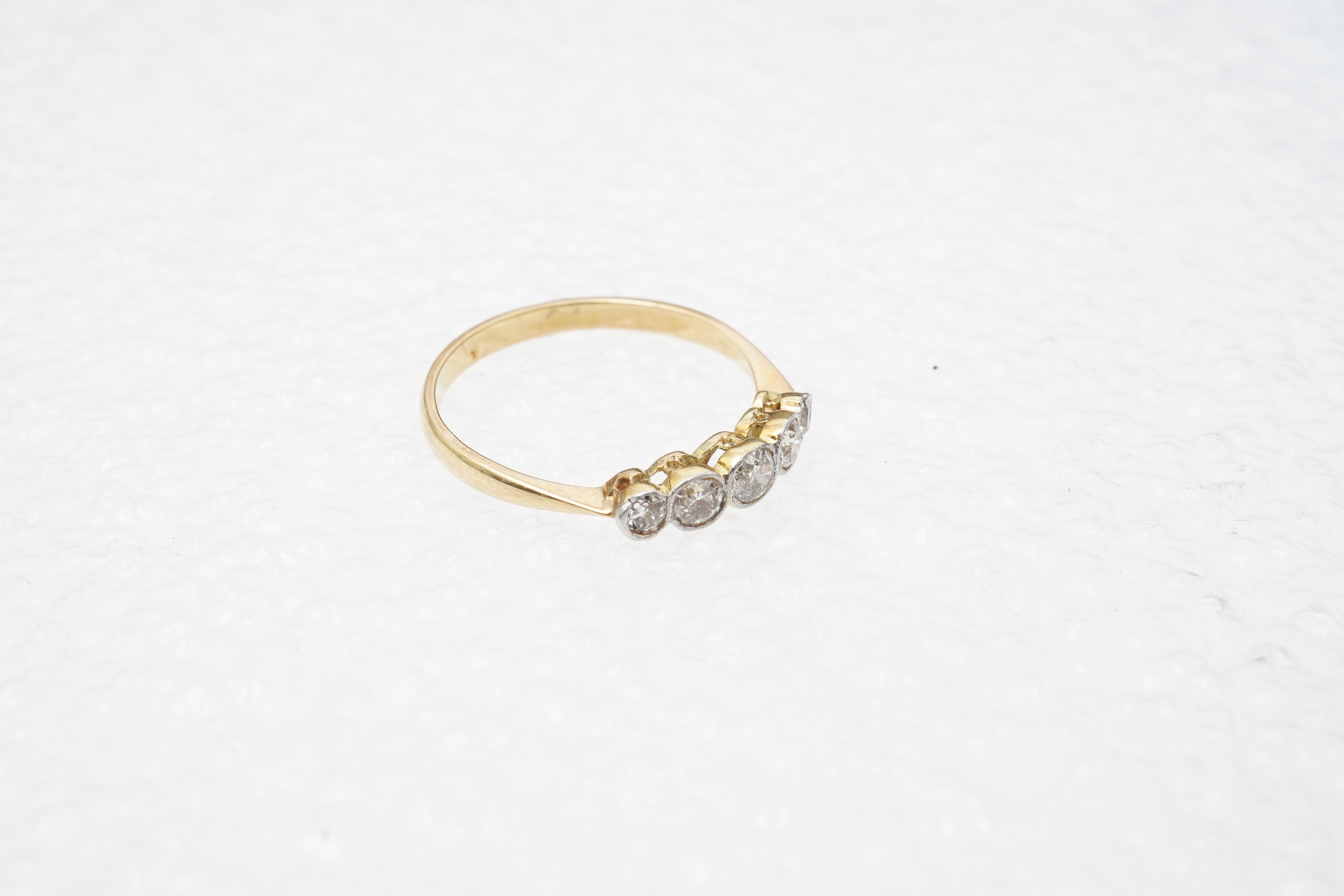 A five-stone diamond ring, early 20th century